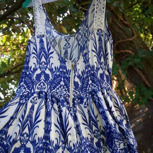 100% rayon paper crane romper